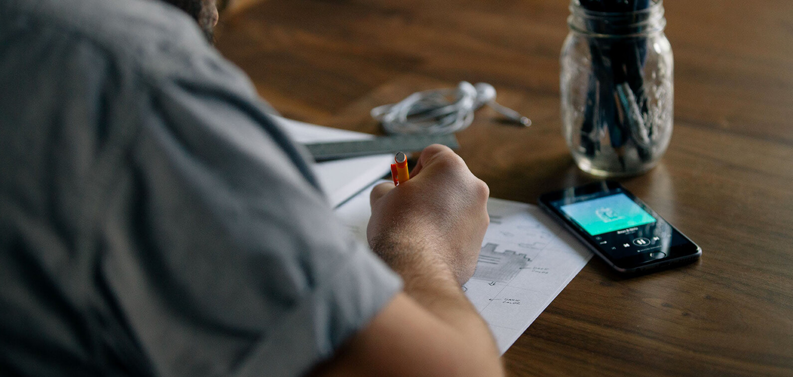UX fesigner sketching wireframes for a new Drupal project UX designer sketching wireframes for a new Drupal project